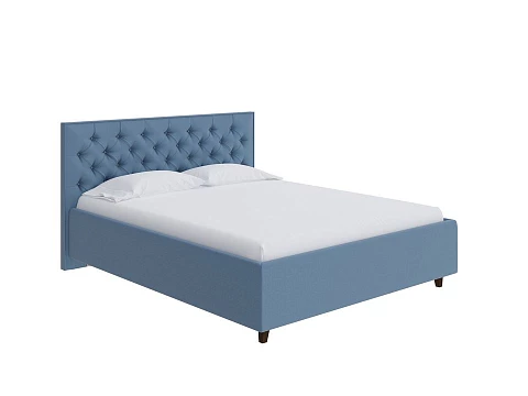 Кровать 140х200 Teona - Кровать с высоким изголовьем, украшенным благородной каретной пиковкой.